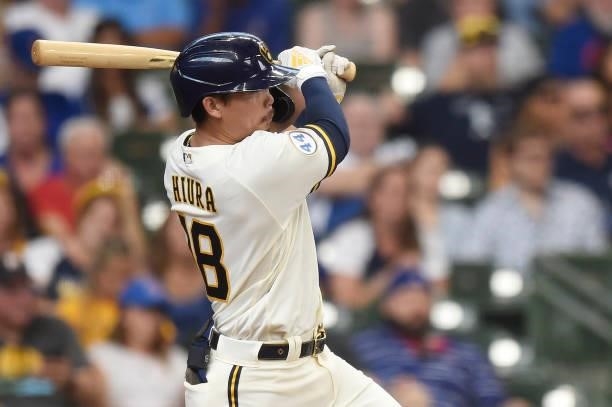Keston Hiura of the Milwaukee Brewers hits an RBI single against the Chicago Cubs in the second inning at American Family Field on June 30, 2021 in...