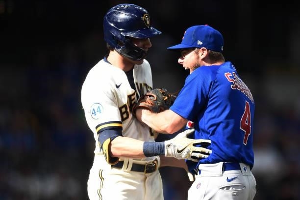 Eric Sogard of the Chicago Cubs reacts as he tags out Christian Yelich of the Milwaukee Brewers on a ground ball to end the eighth inning at American...
