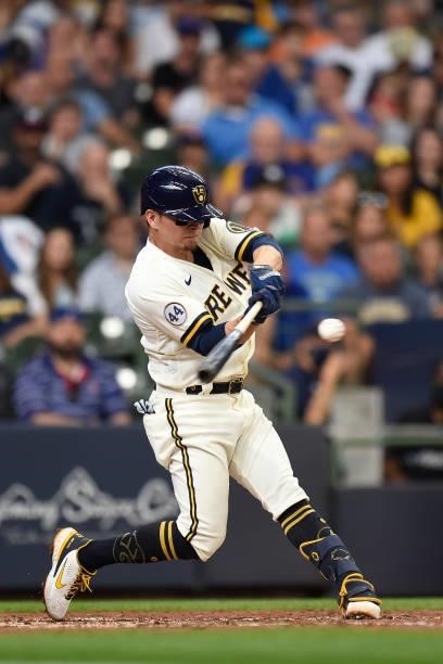 Luis Urias of the Milwaukee Brewers hits a two-run home run against the Chicago Cubs in the second inning at American Family Field on June 30, 2021...