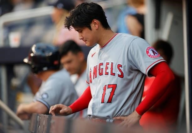 Shohei Ohtani of the Los Angeles Angels looks on from the dugout during the first inning against the New York Yankees at Yankee Stadium on June 30,...
