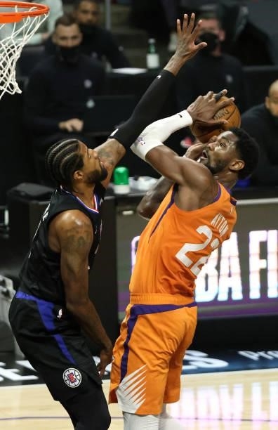 Deandre Ayton of the Phoenix Suns goes up for a shot against Paul George of the LA Clippers during the first half in Game Six of the Western...