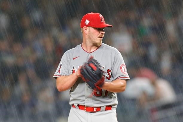 Dylan Bundy of the Los Angeles Angels pitches in the rain during the fourth inning against the New York Yankees at Yankee Stadium on June 30, 2021 in...