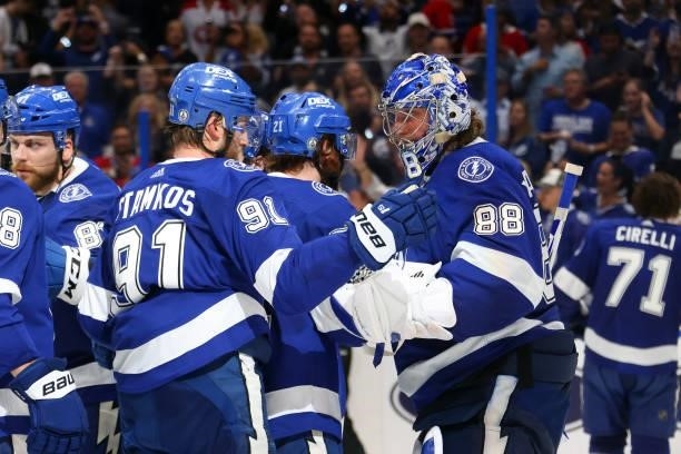 Steven Stamkos congratulates Andrei Vasilevskiy of the Tampa Bay Lightning after defeating the Montreal Canadiens 3-1 in Game Two of the 2021 NHL...