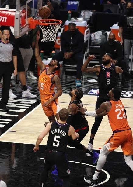 Cameron Payne of the Phoenix Suns goes up for a shot against Paul George of the LA Clippers during the second half in Game Six of the Western...