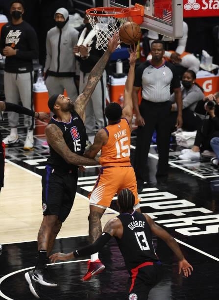 DeMarcus Cousins of the LA Clippers defends against Cameron Payne of the Phoenix Suns during the second half in Game Six of the Western Conference...
