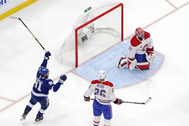 Steven Stamkos of the Tampa Bay Lightning celebrates a goal by Anthony Cirelli past Carey Price of the Montreal Canadiens during the second period in...