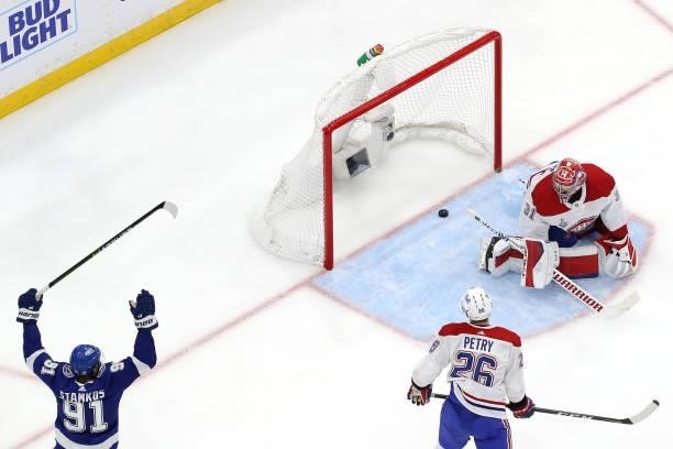 Steven Stamkos of the Tampa Bay Lightning celebrates a goal by Anthony Cirelli past Carey Price of the Montreal Canadiens during the second period in...