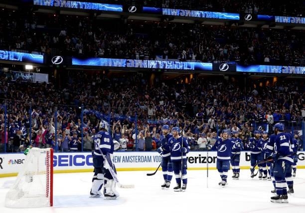 The Tampa Bay Lightning acknowledge the crowd after their 3-1 victory over the Montreal Canadiens after Game Two of the 2021 Stanley Cup Final at...