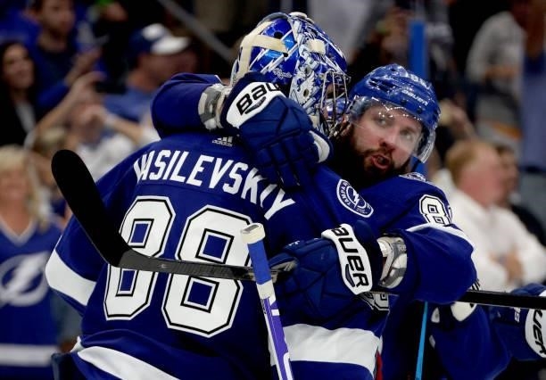 Nikita Kucherov of the Tampa Bay Lightning celebrates with goaltender Andrei Vasilevskiy after their 3-1 victory over the Montreal Canadiens after...