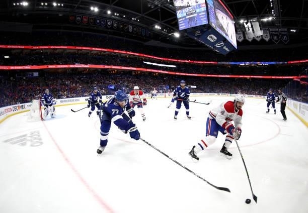 Victor Hedman of the Tampa Bay Lightning reaches to stop Phillip Danault of the Montreal Canadiens during the third period of Game Two of the 2021...