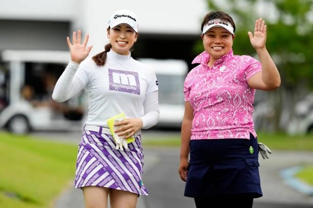 Aya Tamura and Eriko Tenra of Japan pose on their way to the 1st tee during the third round of the Sky Ladies ABC Cup at the ABC Golf Club on July 1,...