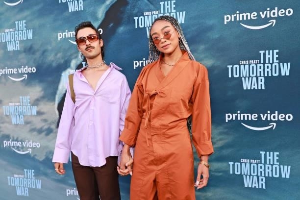 Tati Gabrielle and guest attend the premiere of Amazon's "The Tomorrow War