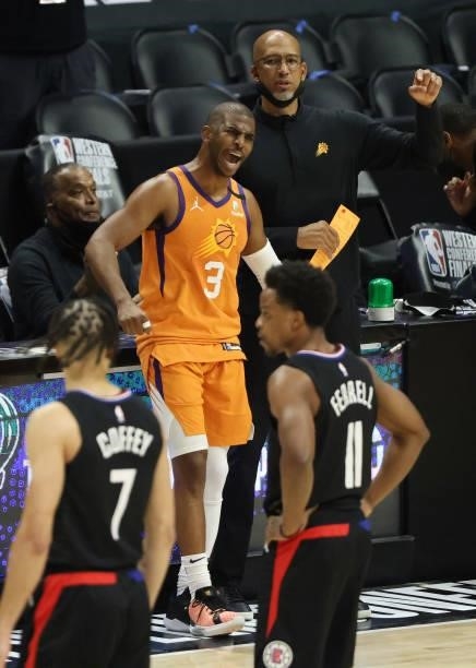 Chris Paul of the Phoenix Suns celebrate as he is taken out of the game during the second half in Game Six of the Western Conference Finals against...
