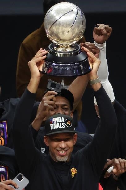 Head Coach Monty Williams of the Phoenix Suns holds the Western Conference Championship trophy after the Suns defeated the LA Clippers in Game Six of...