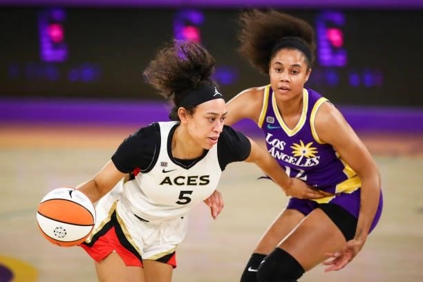 Forward Dearica Hamby of the Las Vegas Aces handles the ball defended by forward Nia Coffey of the Los Angeles Sparks at Los Angeles Convention...