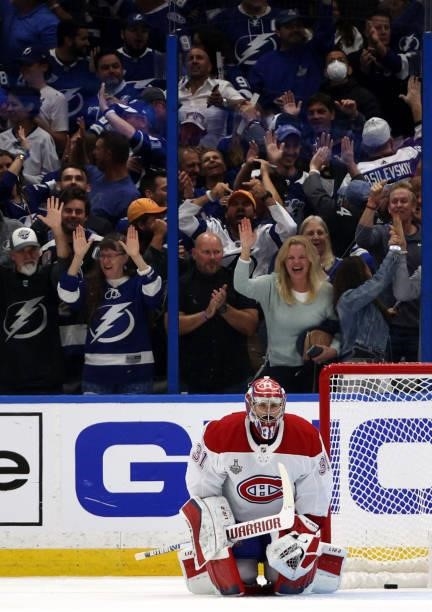 The crowd cheers as goaltender Carey Price of the Montreal Canadiens reacts after allowing a goal by Ondrej Palat of the Tampa Bay Lightning during...