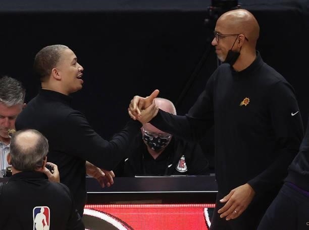 Head coach Tyronn Lue of the LA Clippers congratulates head coach Monty Williams of the Phoenix Suns after the Sun's beat the Clippers to win the...