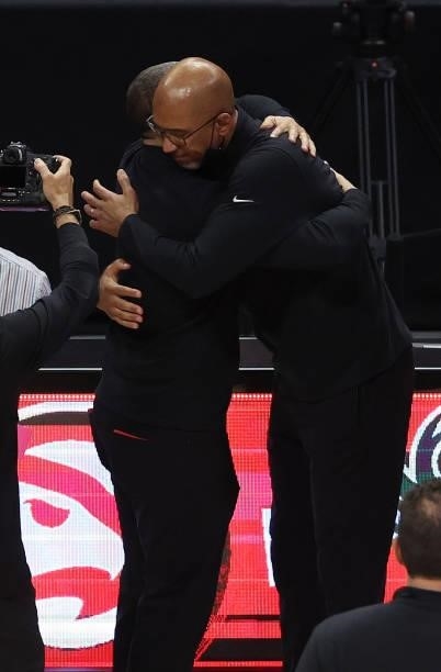 Head coach Tyronn Lue of the LA Clippers congratulates head coach Monty Williams of the Phoenix Suns after the Sun's beat the Clippers to win the...