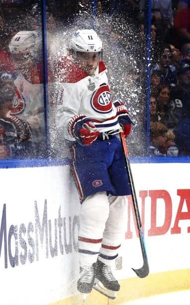 Brendan Gallagher of the Montreal Canadiens collides at the glass while playing against the Tampa Bay Lightning during the third period of Game Two...