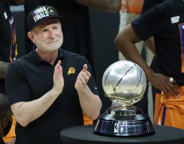 Owner Robert Sarver stands with the Western Conference Championship trophy after the Suns beat the LA Clippers to win the series in Game Six of the...