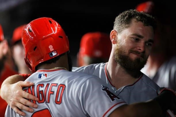 Jared Walsh hugs Luis Rengifo of the Los Angeles Angels after Renfigo's go-ahead 2-RBI single during the ninth inning against the New York Yankees at...