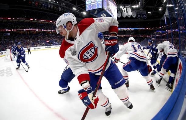 Corey Perry of the Montreal Canadiens battles in the corner against the Tampa Bay Lightning during the third period of Game Two of the 2021 Stanley...