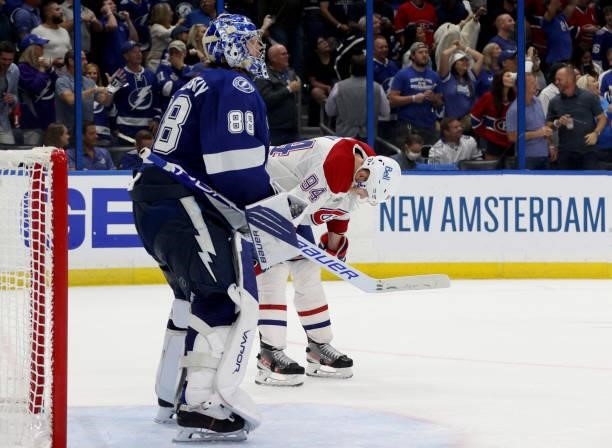 Corey Perry of the Montreal Canadiens is seen dejected behind goaltender Andrei Vasilevskiy of the Tampa Bay Lightning during the third period of...