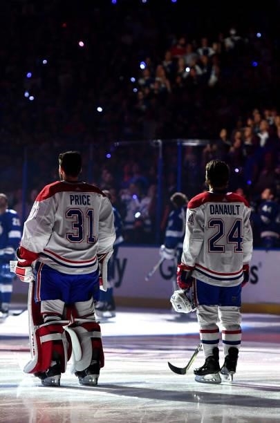 Goaltender Carey Price and Phillip Danault of the Montreal Canadiens line up during pregame for Game Two of the 2021 Stanley Cup Final against the...