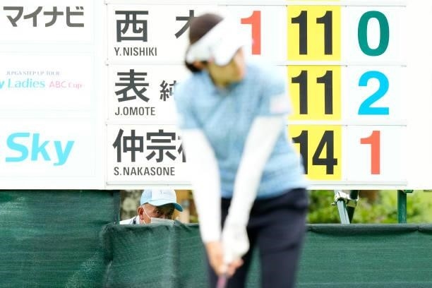 Volunteer watches Sumika Nakasone of Japan hits her tee shot 16th hole during the third round of the Sky Ladies ABC Cup at the ABC Golf Club on July...