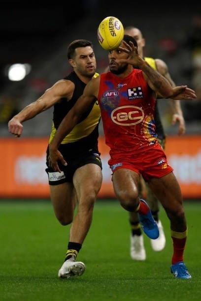 Touk Miller of the Suns chases the ball during the round 16 AFL match between the Gold Coast Suns and the Richmond Tigers at Marvel Stadium on July...