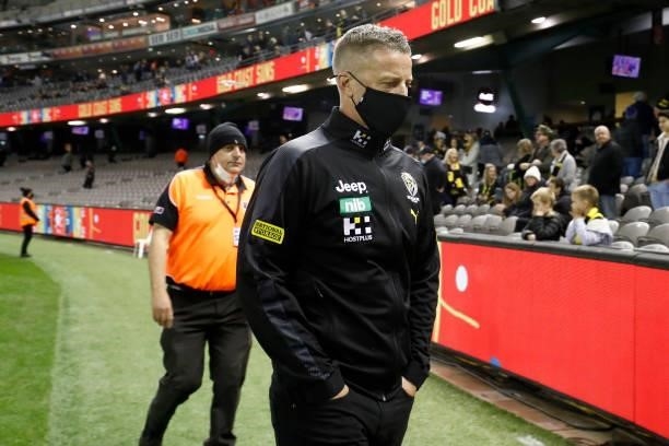 Richmond senior coach, Damien Hardwick walks from the ground after the round 16 AFL match between the Gold Coast Suns and the Richmond Tigers at...