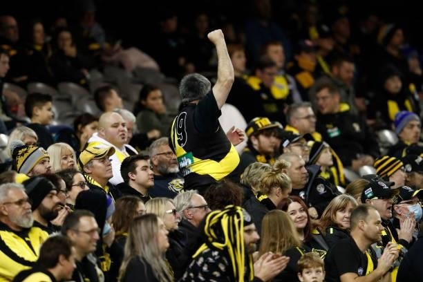 Richmond fans cheer during the round 16 AFL match between the Gold Coast Suns and the Richmond Tigers at Marvel Stadium on July 01, 2021 in...
