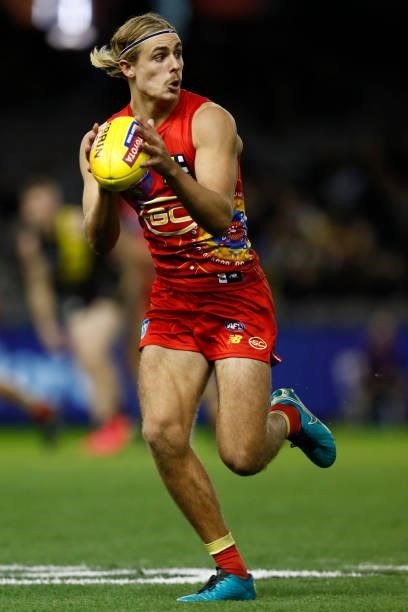 Jeremy Sharp of the Suns runs with the ball during the round 16 AFL match between the Gold Coast Suns and the Richmond Tigers at Marvel Stadium on...