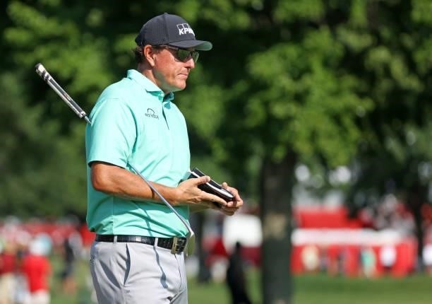 Phil Mickelson prepares to putt on the 16th green during the first round of the Rocket Mortgage Classic on July 01, 2021 at the Detroit Golf Club in...