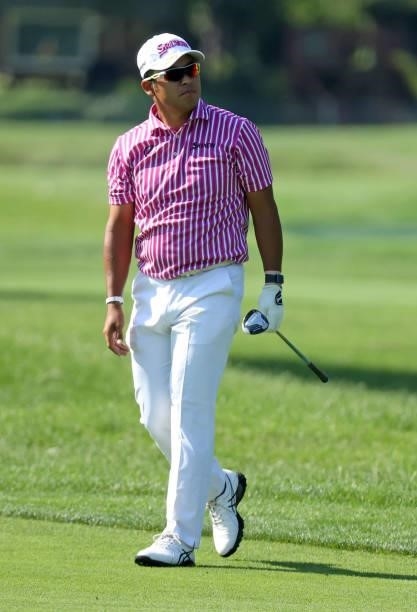 Hideki Matsuyama of Japan plays his shot on the 17th hole during the first round of the Rocket Mortgage Classic on July 01, 2021 at the Detroit Golf...