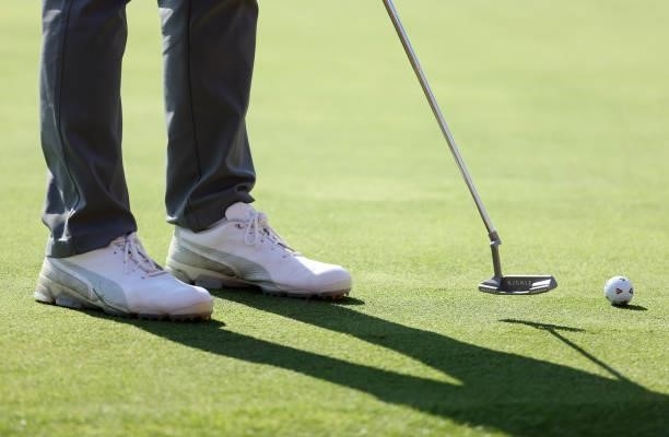 Detail of the shoes of Rickie Fowler on the 17th green during the first round of the Rocket Mortgage Classic on July 01, 2021 at the Detroit Golf...