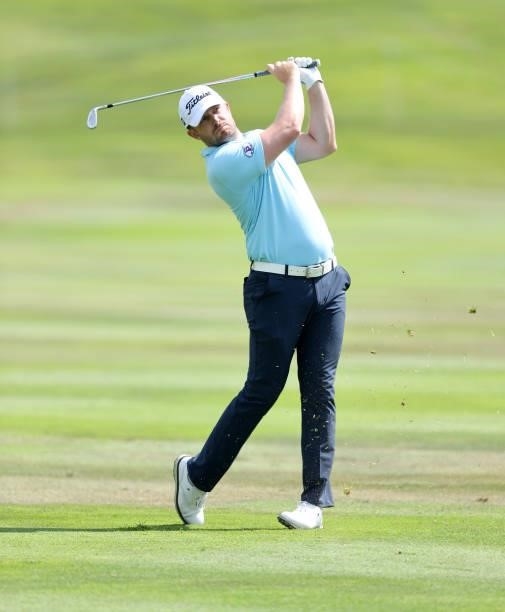 Garrick Porteous of England plays his second shot on the 18th hole during Day One of The Dubai Duty Free Irish Open at Mount Juliet Golf Club on July...