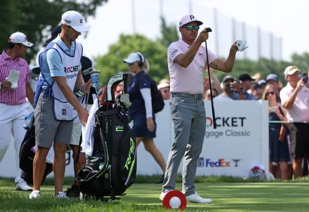 Rickie Fowler prepares to play his shot from the fifth tee during the first round of the Rocket Mortgage Classic on July 01, 2021 at the Detroit Golf...