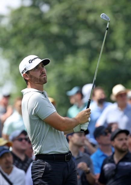 Matthew Wolff plays his shot from the fifth tee during the first round of the Rocket Mortgage Classic on July 01, 2021 at the Detroit Golf Club in...