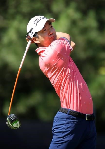 Michael Kim plays his shot from the fourth tee during the first round of the Rocket Mortgage Classic on July 01, 2021 at the Detroit Golf Club in...