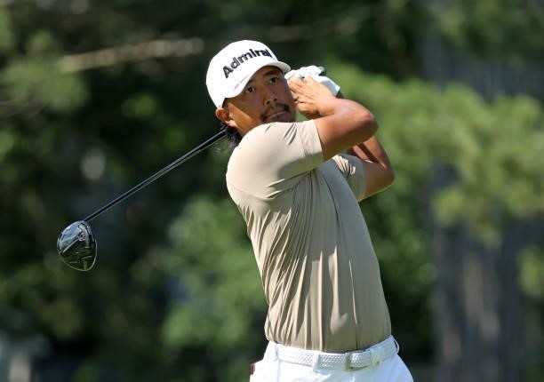 Satoshi Kodaira of Japan plays his shot from the fourth tee during the first round of the Rocket Mortgage Classic on July 01, 2021 at the Detroit...
