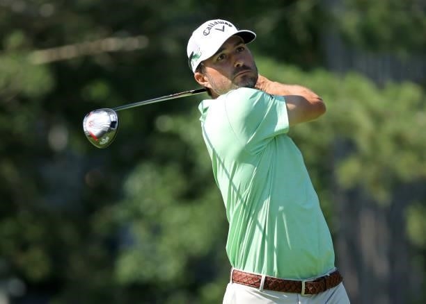 Kevin Kisner plays his shot from the fourth tee during the first round of the Rocket Mortgage Classic on July 01, 2021 at the Detroit Golf Club in...