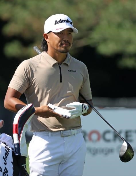 Satoshi Kodaira of Japan prepares to play his shot from the fourth tee during the first round of the Rocket Mortgage Classic on July 01, 2021 at the...