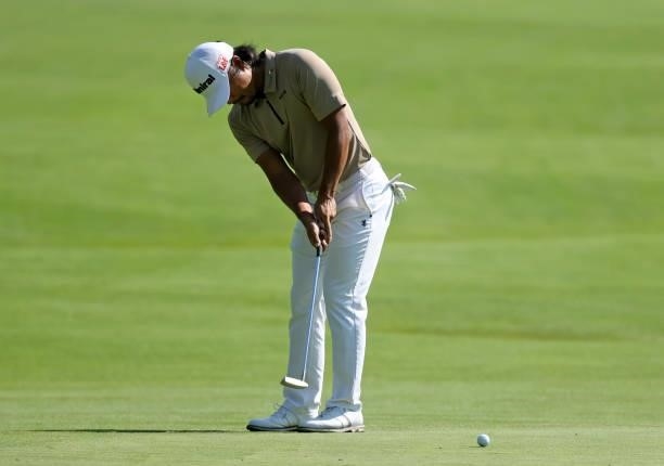Satoshi Kodaira of Japan putts on the third green during the first round of the Rocket Mortgage Classic on July 01, 2021 at the Detroit Golf Club in...