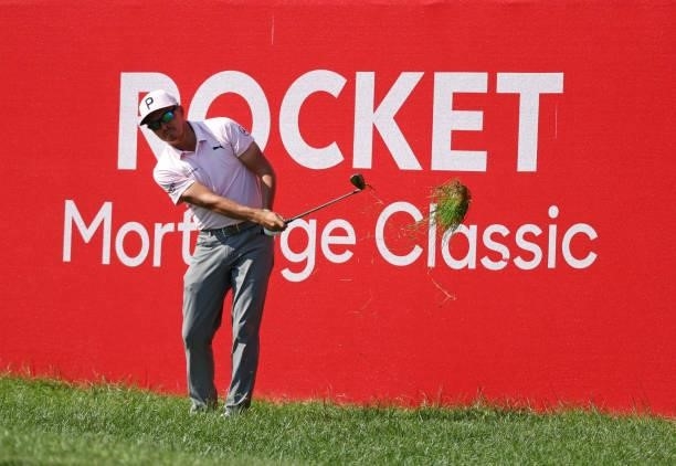 Rickie Fowler chips onto the 17th green during the first round of the Rocket Mortgage Classic on July 01, 2021 at the Detroit Golf Club in Detroit,...