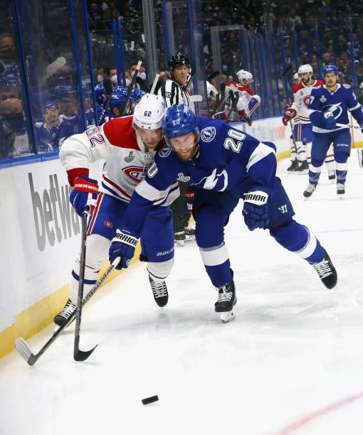 Artturi Lehkonen of the Montreal Canadiens skates against Blake Coleman of the Tampa Bay Lightning in Game Two of the 2021 NHL Stanley Cup Final at...
