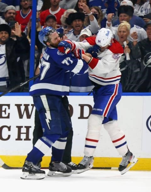 Corey Perry of the Montreal Canadiens punches Victor Hedman of the Tampa Bay Lightning near the end of Game Two of the 2021 NHL Stanley Cup Final at...