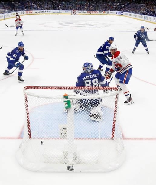 Shot by Nick Suzuki of the Montreal Canadiens gets past Andrei Vasilevskiy of the Tampa Bay Lightning during the second period in Game Two of the...