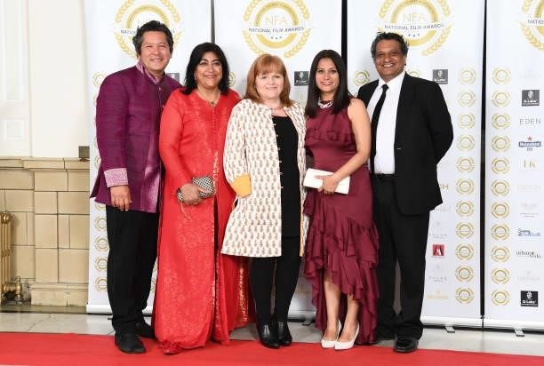 Paul Mayeda Berges, Gurinder Chadha, Lesley Nicol and guests attend the National Film Awards 2021 held at Porchester Hall on July 1, 2021 in London,...