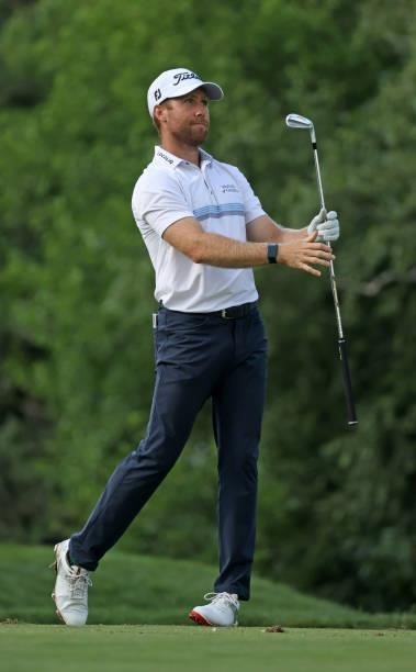 Tyler Duncan plays his shot from the ninth tee during the first round of the Rocket Mortgage Classic on July 01, 2021 at the Detroit Golf Club in...